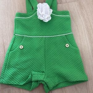 Green Quilted Romper with White Flower Accent